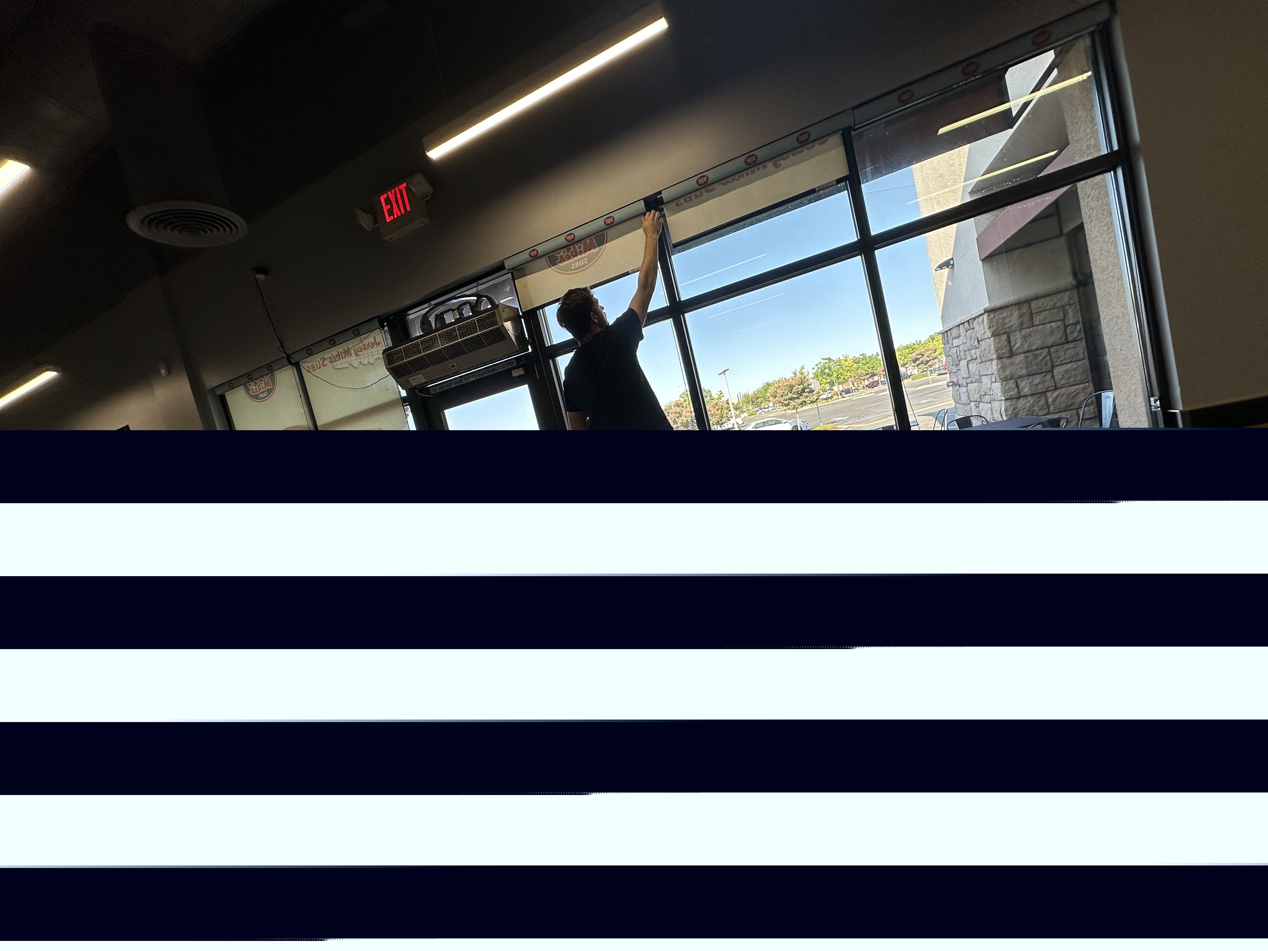 Professional commercial window tinting installation at restaurant in Fresno - Victory Window Tinting